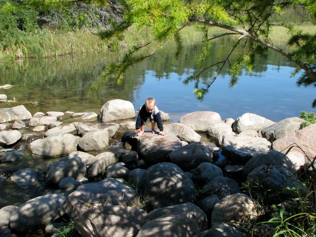 kid crossing the headwaters